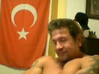 Steamy Faggot Turkish Muscle Hunk Shows Off His Muscles